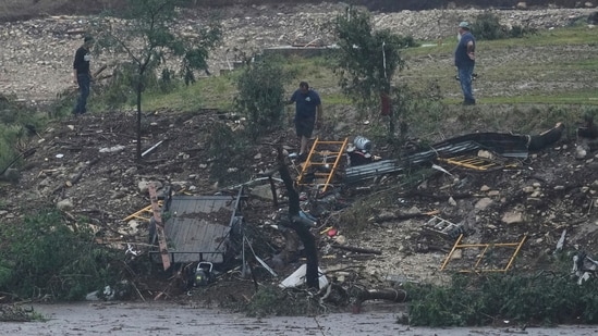 Debris is left behind by a raging Guadalupe River.(AP Photo)