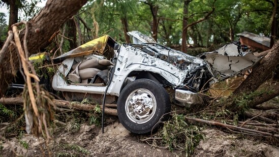 A vehicle sits wrecked after deadly flooding in Kerr County, Texas, U.S., July 5, 2025.(REUTERS/Sergio Flores)