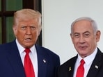 US President Donald Trump welcomes Israeli Prime Minister Benjamin Netanyahu at the entrance of the White House in Washington, D.C.