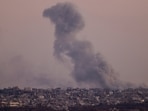 Smoke rises in Gaza after an explosion, as seen from the Israeli side of the border amid talks with Hamas.