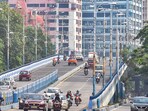 Vehicles on a flyover after easing of restrictions of Covid-19 lockdown, in Kolkata on Tuesday. Vehicles on a flyover after easing of restrictions of Covid-19 lockdown, in Kolkata on Tuesday.