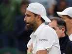 Bulgaria's Grigor Dimitrov (L) reacts after getting injured as he plays against Italy's Jannik Sinner during their men's singles fourth round tennis match on the eighth day of the 2025 Wimbledon Championships at The All England Lawn Tennis and Croquet Club in Wimbledon, southwest London, on July 7, 2025. (Photo by Adrian Dennis / AFP) / RESTRICTED TO EDITORIAL USE Bulgaria's Grigor Dimitrov (L) reacts after getting injured as he plays against Italy's Jannik Sinner during their men's singles fourth round tennis match on the eighth day of the 2025 Wimbledon Championships at The All England Lawn Tennis and Croquet Club in Wimbledon, southwest London, on July 7, 2025. (Photo by Adrian Dennis / AFP) / RESTRICTED TO EDITORIAL USE