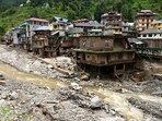 Debris and silt near damaged houses at a flood-affected area, in Mandi district, as Himachal Pradesh continues to witness heavy rains. Debris and silt near damaged houses at a flood-affected area, in Mandi district, as Himachal Pradesh continues to witness heavy rains.