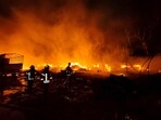 Fire broke out at a truck terminal at Turbhe, causing a blast at the spot, on Sunday, in Navi Mumbai. Fire broke out at a truck terminal at Turbhe, causing a blast at the spot, on Sunday, in Navi Mumbai.