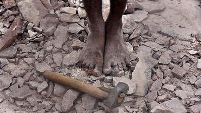 A mine worker without proper footwear or protective gear in Rajasthan. (Raj K Raj/HT File Photo) A mine worker without proper footwear or protective gear in Rajasthan. (Raj K Raj/HT File Photo)