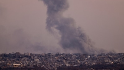 Smoke rises in Gaza after an explosion, as seen from the Israeli side of the border amid talks with Hamas. (REUTERS)
