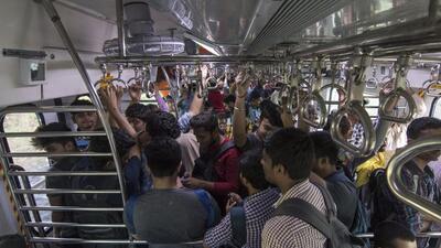 Mumbai, India - January 30, 2020: People travel from Central Railways first Air conditioned EMU local train which goes from Panvel to Thane in Mumbai, India, on Thursday, January 30, 2020. (Photo by Pratik Chorge/Hindustan Times) (Pratik Chorge/HT Photo) Mumbai, India - January 30, 2020: People travel from Central Railways first Air conditioned EMU local train which goes from Panvel to Thane in Mumbai, India, on Thursday, January 30, 2020. (Photo by Pratik Chorge/Hindustan Times) (Pratik Chorge/HT Photo)