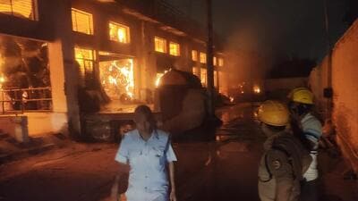 The firefighting measures controlled the fire to a major extent, but the paper rolls smouldering continued, said officials. (HT Photos) The firefighting measures controlled the fire to a major extent, but the paper rolls smouldering continued, said officials. (HT Photos)