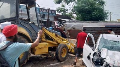 The mini bus and the car after the accident near Sagran village on Hajipur road in Hoshiarpur’s Dasuya sub division on Monday. (HT Photo) The mini bus and the car after the accident near Sagran village on Hajipur road in Hoshiarpur’s Dasuya sub division on Monday. (HT Photo)