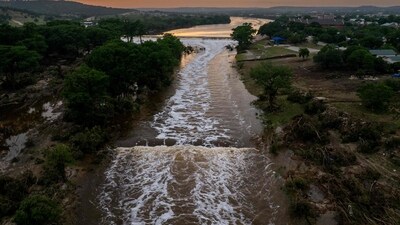 KERRVILLE, TEXAS - JULY 06: In an aerial view, the sun sets over the Guadalupe River on July 06, 2025 in Kerrville, Texas. Heavy rainfall caused severe flooding along the Guadalupe River in central Texas, leaving more than 80 people reported dead. Brandon Bell/Getty Images/AFP (Photo by Brandon Bell / GETTY IMAGES NORTH AMERICA / Getty Images via AFP) (Getty Images via AFP) KERRVILLE, TEXAS - JULY 06: In an aerial view, the sun sets over the Guadalupe River on July 06, 2025 in Kerrville, Texas. Heavy rainfall caused severe flooding along the Guadalupe River in central Texas, leaving more than 80 people reported dead. Brandon Bell/Getty Images/AFP (Photo by Brandon Bell / GETTY IMAGES NORTH AMERICA / Getty Images via AFP) (Getty Images via AFP)