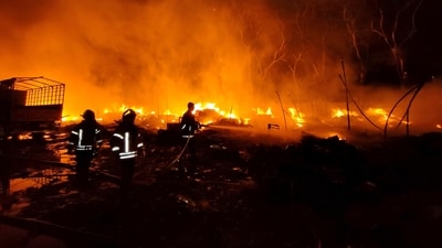 Fire broke out at a truck terminal at Turbhe, causing a blast at the spot, on Sunday, in Navi Mumbai. (PTI) Fire broke out at a truck terminal at Turbhe, causing a blast at the spot, on Sunday, in Navi Mumbai. (PTI)