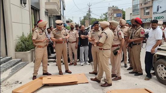 Police at the site where textile firm owner Sanjay Verma was shot dead in Abohar town of Fazilka district on Monday. (HT Photo)