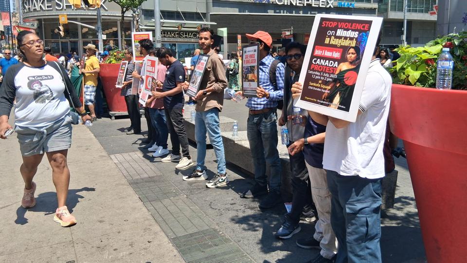 Protesters gathered in downtown Toronto on Saturday to create awareness about violent attacks targeting minorities in Bangladesh. (Credit: HT Photo) Protesters gathered in downtown Toronto on Saturday to create awareness about violent attacks targeting minorities in Bangladesh. (Credit: HT Photo)