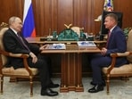 Russian President Vladimir Putin, left, meets with then Russian transport minister Roman Starovoit at the Kremlin in Moscow, on January 30, 2025.
