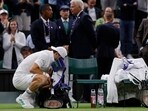 Bulgaria's Grigor Dimitrov reacts after he retires injured from his round of 16 match against Italy's Jannik Sinner