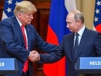 US President Donald Trump (L) and Russia's President Vladimir Putin shake hands before attending a joint press conference. US President Donald Trump (L) and Russia's President Vladimir Putin shake hands before attending a joint press conference.