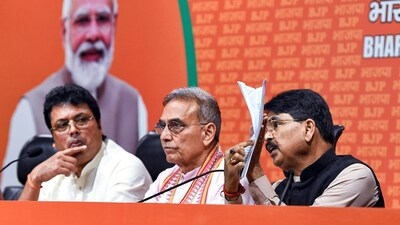 Panel member Satya Pal Singh alleged that the handwritten complaint submitted by the victim had been tampered with to remove accused's names. (ANI) Panel member Satya Pal Singh alleged that the handwritten complaint submitted by the victim had been tampered with to remove accused's names. (ANI)