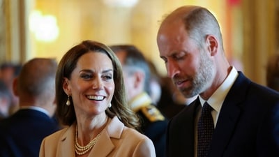 Britain's Catherine, Princess of Wales reacts next to Britain's Prince William, Prince of Wales during a visit of the Royal Collection at Windsor Castle, in Windsor west of London, on July 8, 2025, on the first day of a three-day state visit to Britain.     LUDOVIC MARIN/Pool via REUTERS (via REUTERS)