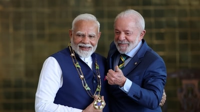 Prime Minister Narendra Modi, left, poses for a photo with Brazil's President Luiz Inacio Lula da Silva, after receiving the Southern Cross Medal, during a meeting at Alvorada Palace in Brasilia, Brazil. (AP) Prime Minister Narendra Modi, left, poses for a photo with Brazil's President Luiz Inacio Lula da Silva, after receiving the Southern Cross Medal, during a meeting at Alvorada Palace in Brasilia, Brazil. (AP)