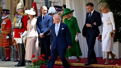 Britain's King Charles III, front, Queen Camilla, 3rd right, Prince William, 5th right, and Kate, Princess of Wales, left, walk with French President Emmanuel Macron, second right, and his wife Brigitte Macron, right, during a welcome ceremony, in Windsor, England, Tuesday July 8, 2025, on the first day of a three-day state visit to Britain. (Dylan Martinez/Pool via AP) (AP) Britain's King Charles III, front, Queen Camilla, 3rd right, Prince William, 5th right, and Kate, Princess of Wales, left, walk with French President Emmanuel Macron, second right, and his wife Brigitte Macron, right, during a welcome ceremony, in Windsor, England, Tuesday July 8, 2025, on the first day of a three-day state visit to Britain. (Dylan Martinez/Pool via AP) (AP)