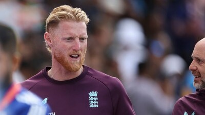 England captain Ben Stokes, left, speaks to member of team support staff after their loss against India on day five of the second cricket test (AP) England captain Ben Stokes, left, speaks to member of team support staff after their loss against India on day five of the second cricket test (AP)
