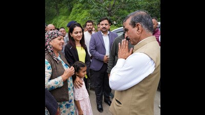 Himachal Pradesh chief minister Sukhvinder Singh Sukhu interacts with people affected by the collapse of a retaining wall constructed by NHAI in Shimla on Tuesday. (PTI) Himachal Pradesh chief minister Sukhvinder Singh Sukhu interacts with people affected by the collapse of a retaining wall constructed by NHAI in Shimla on Tuesday. (PTI)