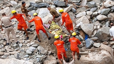 Rescue operations undertaken by NDRC at a flood-affected area, in Mandi district, Himachal Pradesh (PTI) Rescue operations undertaken by NDRC at a flood-affected area, in Mandi district, Himachal Pradesh (PTI)
