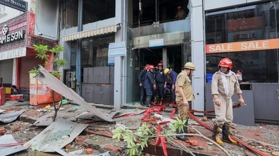 Fire personnel at a Vishal Mega Mart showroom, where a fire broke out on Friday, at Karol Bagh area, in New Delhi on July 5. (PTI) Fire personnel at a Vishal Mega Mart showroom, where a fire broke out on Friday, at Karol Bagh area, in New Delhi on July 5. (PTI)