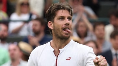 Britain's Cameron Norrie celebrates after winning his round of 16 match against Chile's Nicolas Jarry (REUTERS)