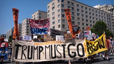 Demonstrators protesting against President Donald Trump and his policies march toward the White House on Friday. (AP File) Demonstrators protesting against President Donald Trump and his policies march toward the White House on Friday. (AP File)