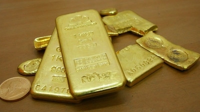 Custom officials seized two plastic pouches containing yellow-coloured paste suspected to be gold. (Reuters)