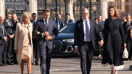 Britain's Prime Minister Keir Starmer (2R) and his wife Victoria Starmer (R), alongside France's President Emmanuel Macron (2L) and his wife Brigitte Macron (L) arrive to attend a ceremony at the statue of war-time Prime Minister Winston Churchill, in Parliament Square, central London on July 8, 2025, on the first day of a three-day state visit to Britain. French President Emmanuel Macron began a three-day state visit to Britain on Tuesday, which saw him address parliament and try to rekindle a purportedly warm relationship with King Charles III. (Photo by CARLOS JASSO / POOL / AFP)(AFP)