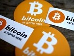 This photograph shows Bitcoin stickers displayed at the microbrewery and bar La Fracasse, in Talence