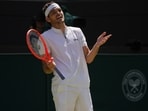 Taylor Fritz of the U.S. reacts during the men's singles quarter final match against Karen Khachanov of Russia at the Wimbledon Taylor Fritz of the U.S. reacts during the men's singles quarter final match against Karen Khachanov of Russia at the Wimbledon