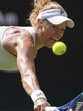 Laura Siegemund of Germany returns to Aryana Sabalenka of Belarus during their quarter-final match. (AP)