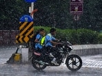 Nagpur rain: Commuters amid rainfall, in Nagpur, Maharashtra. Nagpur rain: Commuters amid rainfall, in Nagpur, Maharashtra.