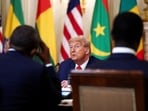 US President Donald Trump hosts a lunch for African leaders of Gabon, Guinea-Bissau, Liberia, Mauritania, and Senegal in the State Dining Room at the White House in Washington, DC.