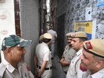 Police found the bodies of the woman and the toddler lying in a pool of blood inside the flat in Majnu Ka Tila. Police found the bodies of the woman and the toddler lying in a pool of blood inside the flat in Majnu Ka Tila.