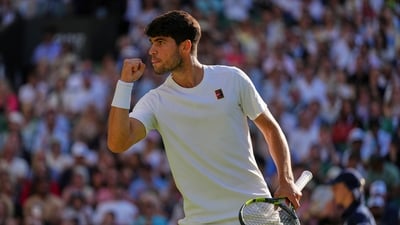 Spain's Carlos Alcaraz reacts after winning a point against Britain's Cameron Norrie during a quarterfinal men's singles match at the Wimbledon (AP) Spain's Carlos Alcaraz reacts after winning a point against Britain's Cameron Norrie during a quarterfinal men's singles match at the Wimbledon (AP)