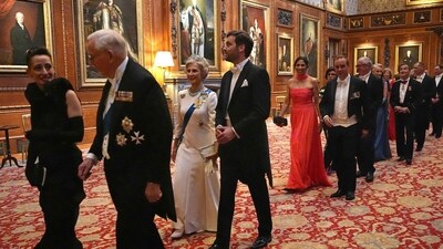 Lebanese-born Paris-based architect Lina Ghotmeh (L), Britain's Prince Richard, Duke of Gloucester (2L), Britain's Birgitte, Duchess of Gloucester (3L) and France's Tristan Bromet arrive to attend a State Banquet at Windsor Castle, west of London. (AFP) Lebanese-born Paris-based architect Lina Ghotmeh (L), Britain's Prince Richard, Duke of Gloucester (2L), Britain's Birgitte, Duchess of Gloucester (3L) and France's Tristan Bromet arrive to attend a State Banquet at Windsor Castle, west of London. (AFP)
