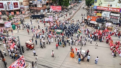 Rapid Action Force (RAF) personnel present at the spot as All India Trade Union Congress (AITUC) and other supporters demonstrate during a 'Bharat Bandh' (a nationwide general strike) call by a forum of 10 central trade unions and their associates, in Patna on Wednesday. (PTI)