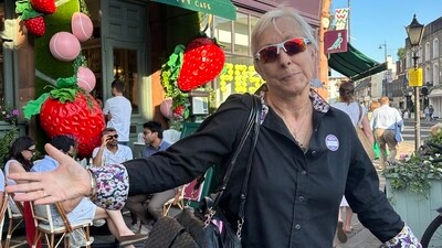 Martina Navratilova's picture shows her standing outside the Wimbledon cafe that denied her entry (X/@Martina) Martina Navratilova's picture shows her standing outside the Wimbledon cafe that denied her entry (X/@Martina)