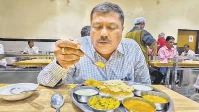 Hindustan Times journalist Yogesh Naik tastes the fare at the Akashwani MLA Hostel’s canteen, and comes away underwhelmed, but was not provoked into violence. (Photo by Raju Shinde) (Raju Shinde) Hindustan Times journalist Yogesh Naik tastes the fare at the Akashwani MLA Hostel’s canteen, and comes away underwhelmed, but was not provoked into violence. (Photo by Raju Shinde) (Raju Shinde)