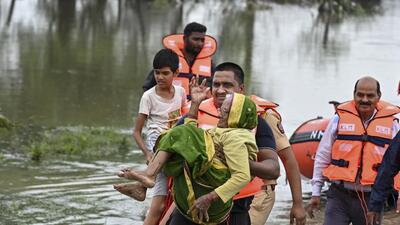 Nagpur: Rescue personnel move people to a safer place following flood-like situation after heavy rainfall, in Nagpur, Maharashtra, Wednesday, July 9, 2025. The India Meteorological Department (IMD) has issued a red alert, predicting heavy rains in Maharashtra's Nagpur district, prompting the administration to declare a holiday for all schools and colleges on Wednesday, officials said. (PTI Photo) (PTI07_09_2025_000210A) (PTI) Nagpur: Rescue personnel move people to a safer place following flood-like situation after heavy rainfall, in Nagpur, Maharashtra, Wednesday, July 9, 2025. The India Meteorological Department (IMD) has issued a red alert, predicting heavy rains in Maharashtra's Nagpur district, prompting the administration to declare a holiday for all schools and colleges on Wednesday, officials said. (PTI Photo) (PTI07_09_2025_000210A) (PTI)