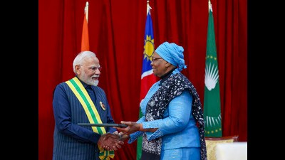 Prime Minister Narendra Modi being conferred with Namibia's highest civilian award, 'Order of the Most Ancient Welwitschia Mirabilis', by Namibian President Netumbo Nandi-Ndaitwah, in Windhoek, Namibia. (PTI) Prime Minister Narendra Modi being conferred with Namibia's highest civilian award, 'Order of the Most Ancient Welwitschia Mirabilis', by Namibian President Netumbo Nandi-Ndaitwah, in Windhoek, Namibia. (PTI)