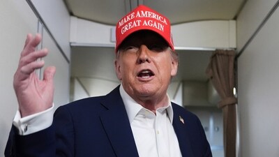 President Donald Trump speaks to reporters on board Air Force One, en route from Joint Base Andrews (AP) President Donald Trump speaks to reporters on board Air Force One, en route from Joint Base Andrews (AP)