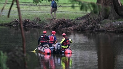 A search and rescue team looks for people along the Guadalupe River near Camp Mystic in Hunt, Texas, on July 7, 2025, following severe flash flooding that occurred during the July 4 holiday weekend. (Photo by RONALDO SCHEMIDT / AFP) (AFP) A search and rescue team looks for people along the Guadalupe River near Camp Mystic in Hunt, Texas, on July 7, 2025, following severe flash flooding that occurred during the July 4 holiday weekend. (Photo by RONALDO SCHEMIDT / AFP) (AFP)