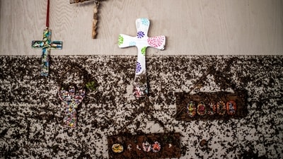 Crosses hang on a wall with flood marks at Camp Mystic, in the aftermath of deadly flooding in Kerr County.  REUTERS/Sergio Flores (REUTERS)