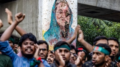 Students chant slogans near a vandalised mural of Bangladesh's ousted Prime Minister Sheikh Hasina, during a protest demanding accountability and trial against Hasina, near Dhaka University (AFP) Students chant slogans near a vandalised mural of Bangladesh's ousted Prime Minister Sheikh Hasina, during a protest demanding accountability and trial against Hasina, near Dhaka University (AFP)