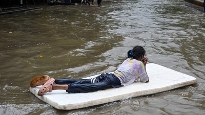 In the city, areas like Salt Lake, Howrah, and central Kolkata reported waterlogging due to relentless overnight showers. Office-goers and students waded through submerged streets, while public transport, including buses and autos, was hampered across multiple routes. (HT Photo/Samir Jana) In the city, areas like Salt Lake, Howrah, and central Kolkata reported waterlogging due to relentless overnight showers. Office-goers and students waded through submerged streets, while public transport, including buses and autos, was hampered across multiple routes. (HT Photo/Samir Jana)